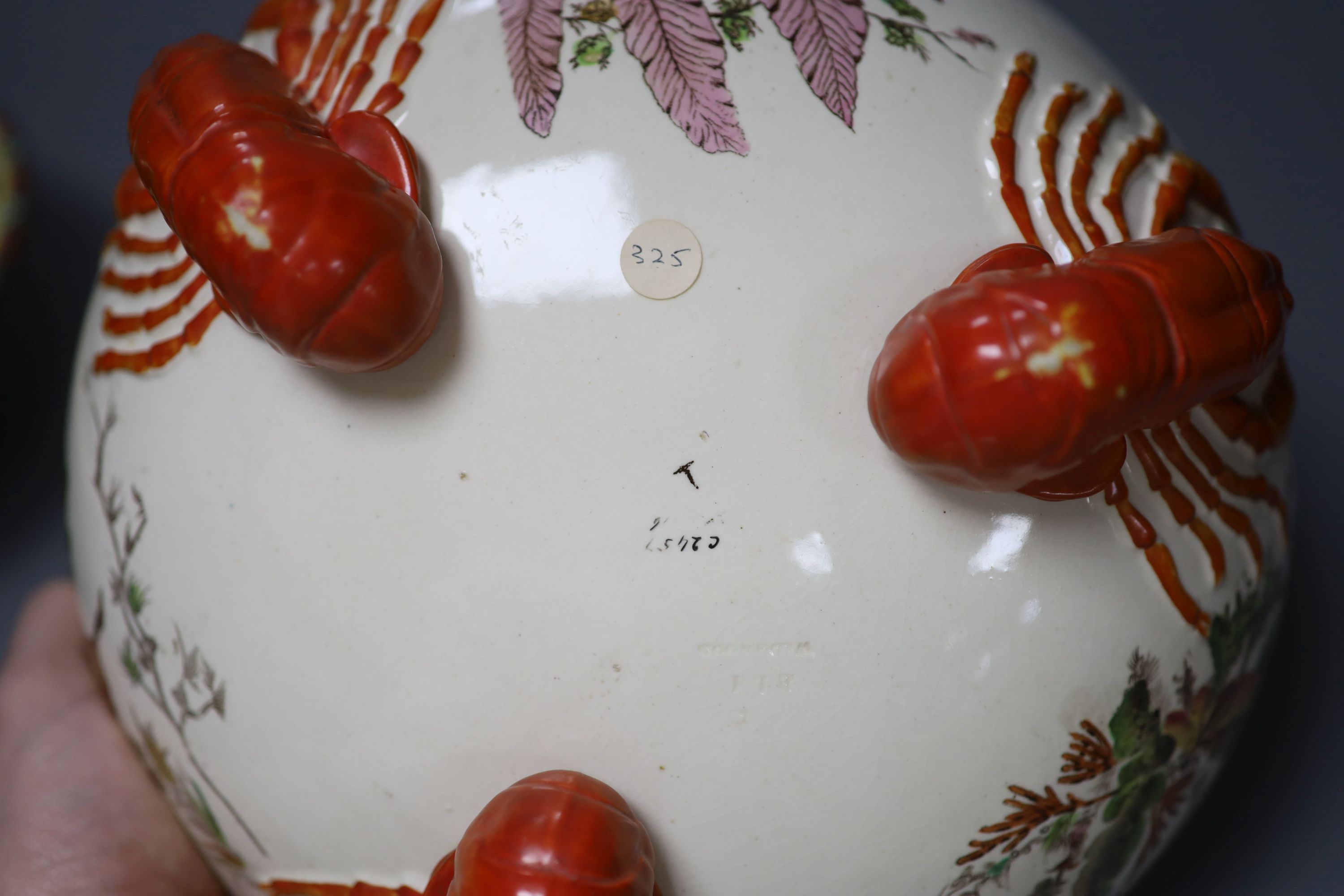 A Wedgwood majolica dolphin footed dish, a lobster footed bowl and an oval tray (3)